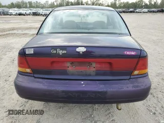 1996 Saturn SL with VIN 1G8ZK5278TZ255742, listed as a Copart auction lot 79050024 with 83,205 mi miles and Salvage title. Bid and sale history available at DreamBid. Image 6.