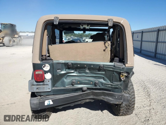 2002 Jeep Wrangler Sahara with VIN 1J4FA59S02P761365, listed as a Copart auction lot 81899144 with 208,429 mi miles and Salvage title. Bid and sale history available at DreamBid. Image 6.