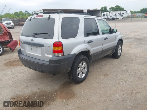 2006 Ford Escape XLT z VIN 1FMYU03136KA68913, wystawiony jako IAAI lot #42265822 z przebiegiem 129 401 mil mil oraz . Historia ofert i sprzedaży dostępna na DreamBid. Obrazek 4.