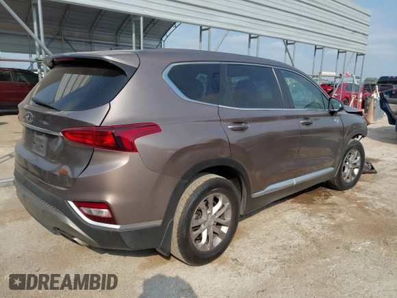 2020 Hyundai Santa Fe SE with VIN 5NMS23AD6LH220012, listed as a IAAI auction lot 42317046 with 141,055 mi miles and . Bid and sale history available at DreamBid. Image 4.