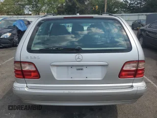 2001 Mercedes-Benz E-Class with VIN WDBJH65J41B201471, listed as a Copart auction lot 68863194 with 106,893 mi miles and Salvage Title. Bid and sale history available at carsss.com. Image 6.