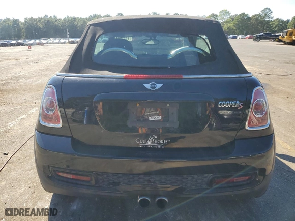 2011 MINI Cooper Convertible s with VIN WMWZP3C58BTX83417, listed as a Copart auction lot 73556814 with 70,130 mi miles and Salvage Title. Bid and sale history available at carsss.com. Image 6.
