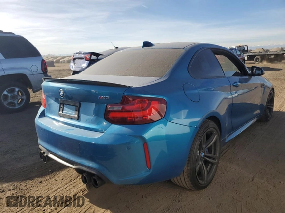 2016 BMW M2 with VIN WBS1H9C52GV351930, listed as a Copart auction lot 86610764 with 55,473 mi miles and Salvage Title. Bid and sale history available at carsss.com. Image 3.
