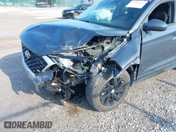 2019 Hyundai Tucson SE with VIN KM8J23A4XKU932814, listed as a IAAI auction lot 40968319 with 107,365 mi miles. Bid and sale history available at carsss.com. Image 6.