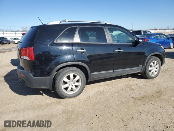 2012 Kia Sorento LX with VIN 5XYKTDA29CG257924, listed as a Copart auction lot 53716185 with 106,850 mi miles and Salvage Title. Bid and sale history available at carsss.com. Image 3.