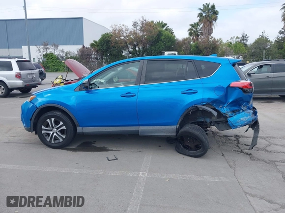 2018 Toyota RAV4 LE with VIN 2T3BFREV6JW740214, listed as a IAAI auction lot 42106349 with 105,831 mi miles and . Bid and sale history available at carsss.com. Image 15.