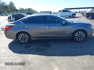 2016 Nissan Altima S z VIN 1N4AL3AP8GC139770, wystawiony jako IAAI lot #41750812 z przebiegiem 116 717 mil mil oraz . Historia ofert i sprzedaży dostępna na DreamBid. Obrazek 13.