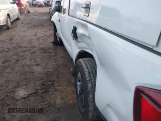 2023 Toyota Tacoma SR с VIN 3TYRX5GN1PT081314, выставлен на аукционе IAAI как лот 41179699 с пробегом 19 476 миль миль и . История ставок и продаж доступна на DreamBid. Изображение 19.