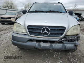 1999 Mercedes-Benz M 320/430/500 with VIN 4JGAB54E9XA127797, listed as a Copart auction lot 51408235 with 243,566 mi miles and Salvage title. Bid and sale history available at DreamBid. Image 5.