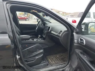 2018 Jeep Grand Cherokee Laredo E with VIN 1C4RJFAG3JC324434, listed as a IAAI auction lot 41812311 with 140,820 mi miles. Bid and sale history available at carsss.com. Image 5.