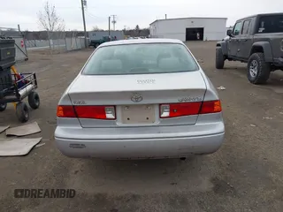 2001 Toyota Camry CE with VIN 4T1BG22K51U046766, listed as a IAAI auction lot 41674202 with 148,581 mi miles. Bid and sale history available at carsss.com. Image 16.