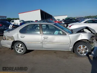 1999 Nissan Altima XE with VIN 1N4DL01D4XC252973, listed as a IAAI auction lot 42005504 with 247,570 mi miles. Bid and sale history available at carsss.com. Image 12.