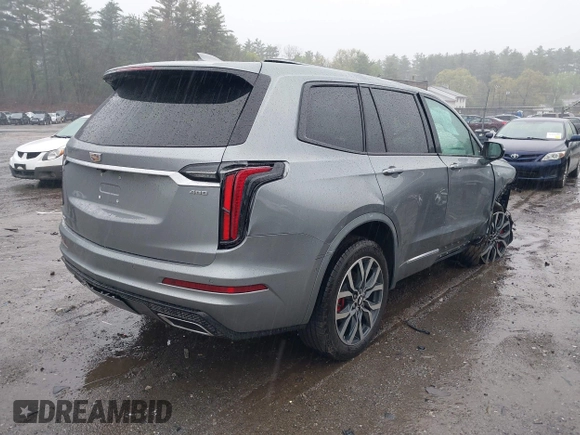 2023 Cadillac XT6 AWD Sport with VIN 1GYKPHRS2PZ179987, listed as a IAAI auction lot 42169973 with 20,623 mi miles and . Bid and sale history available at DreamBid. Image 4.