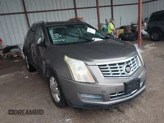 2014 Cadillac SRX Luxury Collection z VIN 3GYFNBE32ES597589, wystawiony jako IAAI lot #42162476 z przebiegiem 130 165 mil mil oraz . Historia ofert i sprzedaży dostępna na DreamBid. Obrazek 1.