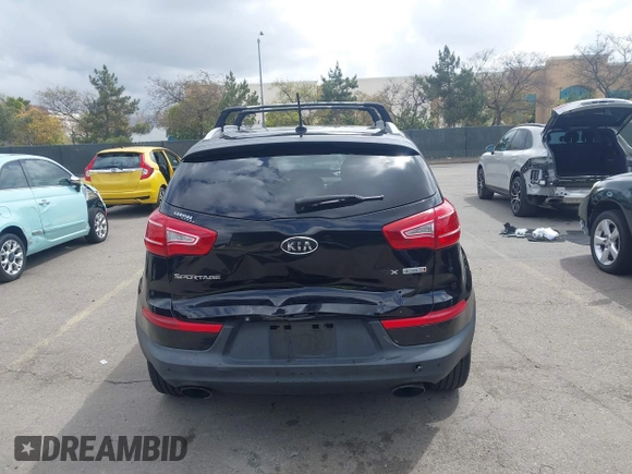 2013 Kia Sportage SX with VIN KNDPCCA61D7385219, listed as a IAAI auction lot 41945345 with 112,471 mi miles and . Bid and sale history available at carsss.com. Image 16.