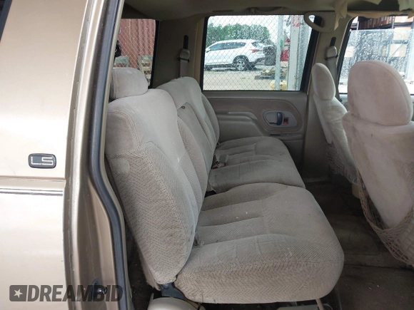 1999 Chevrolet Suburban with VIN 1GNFK16RXXJ416360, listed as a IAAI auction lot 42670294 with 319,691 mi miles and . Bid and sale history available at DreamBid. Image 8.