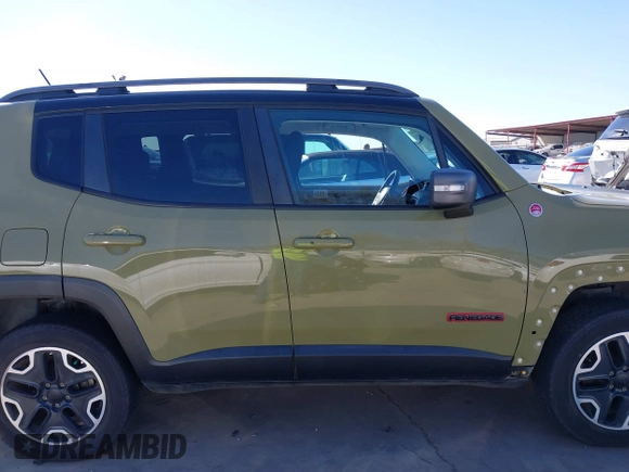 2015 Jeep Renegade Trailhawk with VIN ZACCJBCT6FPC11721, listed as a IAAI auction lot 41759053 with 95,499 mi miles and . Bid and sale history available at DreamBid. Image 14.