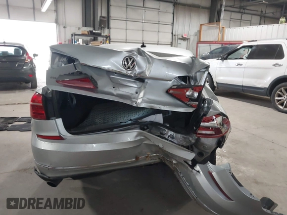 2016 Volkswagen Passat SE z VIN 1VWBT7A37GC027073, wystawiony jako IAAI lot #41073634 z przebiegiem 72 563 mil mil oraz . Historia ofert i sprzedaży dostępna na DreamBid. Obrazek 6.