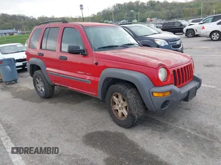 2003 Jeep Liberty Sport with VIN 1J4GL48K03W608325, listed as a IAAI auction lot 42033270 with 210,609 mi miles. Bid and sale history available at carsss.com. Image 1.