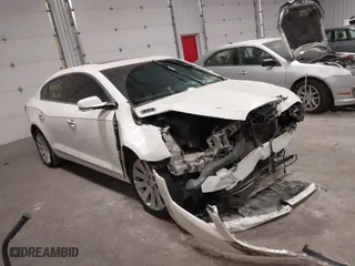 2014 Buick LaCrosse Premium I with VIN 1G4GE5G36EF269293, listed as a IAAI auction lot 41286915 with 152,604 mi miles. Bid and sale history available at carsss.com. Image 1.