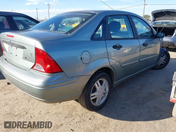 2004 Ford Focus SE with VIN 1FAFP34Z94W157468, listed as a IAAI auction lot 41311417 with Not Provided miles and . Bid and sale history available at DreamBid. Image 4.