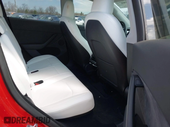 2023 Tesla Model Y Long Range with VIN 7SAYGDEE6PA157652, listed as a IAAI auction lot 41866777 with 22,584 mi miles. Bid and sale history available at carsss.com. Image 8.