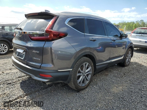 2021 Honda CR-V Touring z VIN 2HKRW2H95MH675002, wystawiony jako Copart lot #57340315 z przebiegiem 41 159 mil mil oraz Szkoda całkowita • Salvage title. Historia ofert i sprzedaży dostępna na DreamBid. Obrazek 3.