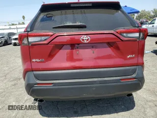 2023 Toyota RAV4 XLE with VIN 2T3W1RFV4PW267940, listed as a Copart auction lot 61827935 with 63,356 mi miles and Salvage title. Bid and sale history available at DreamBid. Image 6.