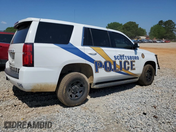 2018 Chevrolet Tahoe Commercial with VIN 1GNLCDEC1JR244940, listed as a Copart auction lot 54713275 with 99,661 mi miles and Salvage title. Bid and sale history available at DreamBid. Image 3.