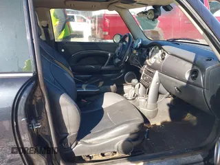 2006 MINI Hardtop S with VIN WMWRE33546TJ34712, listed as a IAAI auction lot 41144701 with 230,006 mi miles and . Bid and sale history available at DreamBid. Image 5.