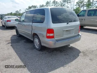 2003 Kia Sedona LX with VIN KNDUP131236417368, listed as a IAAI auction lot 41863624 with 142,896 mi miles. Bid and sale history available at carsss.com. Image 3.