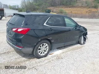 2019 Chevrolet Equinox LT with VIN 2GNAXUEV0K6286221, listed as a IAAI auction lot 41850709 with 124,363 mi miles and . Bid and sale history available at carsss.com. Image 4.