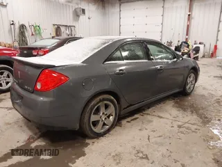 2009 Pontiac G6 1SB z VIN 1G2ZJ57KX94267343, wystawiony jako IAAI lot #41514632 z przebiegiem 164 061 mil mil oraz . Historia ofert i sprzedaży dostępna na DreamBid. Obrazek 4.