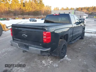2014 Chevrolet Silverado 1500 LT with VIN 1GCVKREC0EZ399955, listed as a IAAI auction lot 41328346 with 111,162 mi miles and . Bid and sale history available at DreamBid. Image 4.