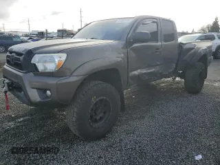 2015 Toyota Tacoma with VIN 5TFUU4EN3FX137113, listed as a Copart auction lot 87556175 with 105,797 mi miles and Salvage title. Bid and sale history available at DreamBid. Image 1.