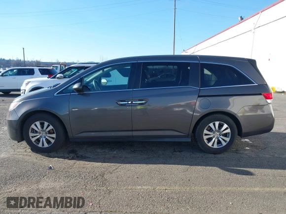 2016 Honda Odyssey SE with VIN 5FNRL5H32GB089740, listed as a IAAI auction lot 41402635 with 120,666 mi miles and . Bid and sale history available at DreamBid. Image 14.