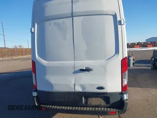 2023 Ford Transit Cargo with VIN 1FTBR3U86PKA39951, listed as a IAAI auction lot 41449397 with 46,883 mi miles and . Bid and sale history available at DreamBid. Image 16.