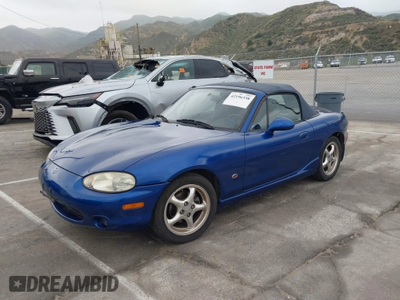 1999 Mazda MX-5 Miata with VIN JM1NB3531X0136037, listed as a IAAI auction lot 42196338 with Not provided miles and . Bid and sale history available at DreamBid. Image 2.