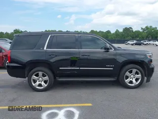 2015 Chevrolet Tahoe LT with VIN 1GNSCBKC4FR145119, listed as a IAAI auction lot 42309931 with 99,408 mi miles and . Bid and sale history available at DreamBid. Image 13.