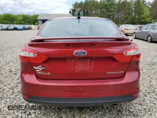 2014 Ford Focus Titanium with VIN 1FADP3J20EL352909, listed as a Copart auction lot 58501085 with 174,388 mi miles and Salvage title. Bid and sale history available at DreamBid. Image 6.
