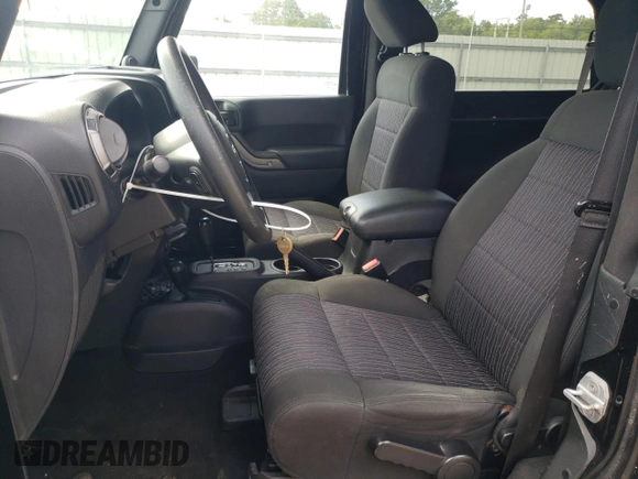 2012 Jeep Wrangler Sport z VIN 1C4AJWAG2CL245174, wystawiony jako Copart lot #63161425 z przebiegiem 136 626 mil mil oraz Czysty tytuł • Clean title. Historia ofert i sprzedaży dostępna na DreamBid. Obrazek 7.