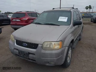 2001 Ford Escape XLT with VIN 1FMYU03141KB51890, listed as a IAAI auction lot 41621695 with 161,930 mi miles. Bid and sale history available at carsss.com. Image 2.
