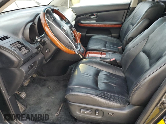 2007 Lexus RX 400h z VIN JTJGW31U972002681, wystawiony jako Copart lot #78883974 z przebiegiem 288 019 mil mil oraz Szkody całkowita. Historia ofert i sprzedaży dostępna na DreamBid. Obrazek 7.