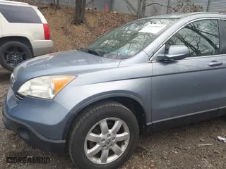 2009 Honda CR-V EX-L with VIN JHLRE48719C007622, listed as a IAAI auction lot 41999801 with 158,976 mi miles. Bid and sale history available at carsss.com. Image 21.