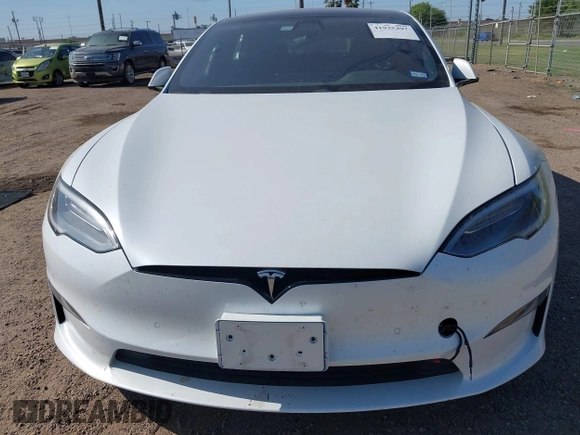 2022 Tesla Model S z VIN 5YJSA1E59NF470813, wystawiony jako IAAI lot #41935297 z przebiegiem Nie podano mil oraz . Historia ofert i sprzedaży dostępna na DreamBid. Obrazek 6.