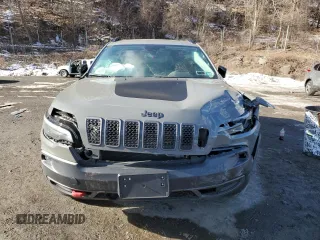 2022 Jeep Cherokee Trailhawk with VIN 1C4PJMBX4ND518870, listed as a Copart auction lot 44784025 with 17,701 mi miles and Salvage Title. Bid and sale history available at carsss.com. Image 5.