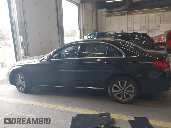 2018 Mercedes-Benz C 300 with VIN 55SWF4KB2JU247861, listed as a IAAI auction lot 41774115 with 63,429 mi miles and . Bid and sale history available at carsss.com. Image 14.