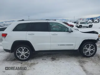 2022 Jeep Grand Cherokee Limited with VIN 1C4RJFBG5NC123297, listed as a IAAI auction lot 41509434 with 58,944 mi miles and . Bid and sale history available at DreamBid. Image 14.