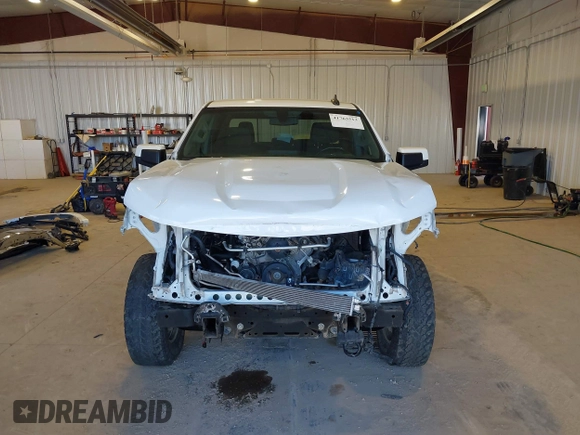 2020 Chevrolet Silverado 1500 LT z VIN 3GCUYDEDXLG311836, wystawiony jako IAAI lot #41763513 z przebiegiem 116 215 mil mil oraz . Historia ofert i sprzedaży dostępna na DreamBid. Obrazek 13.