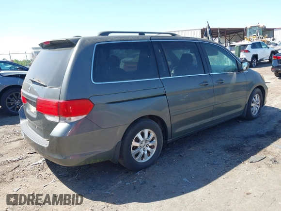 2008 Honda Odyssey EX-L z VIN 5FNRL38768B063991, wystawiony jako IAAI lot #42009031 z przebiegiem 167 524 mil mil oraz . Historia ofert i sprzedaży dostępna na DreamBid. Obrazek 4.